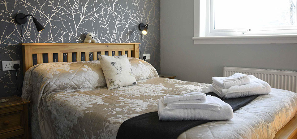 Thistle Dubh Dandy self catering accommodation suite contains a comfortable double bed