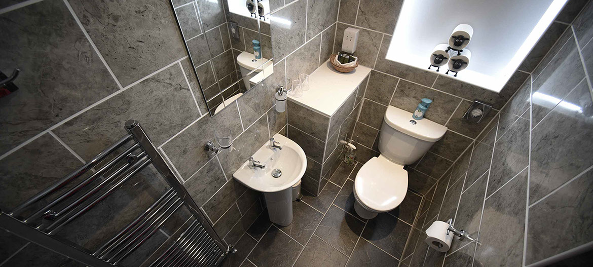 Thistle Dubh Dandy self catering accommodation apartment suite in Portree contains a modern bathroom