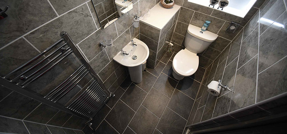 Thistle Dubh Dandy self catering accommodation apartment suite in Portree contains a modern bathroom